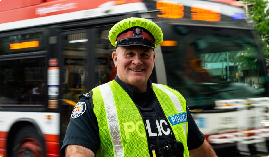 male police officer smiling