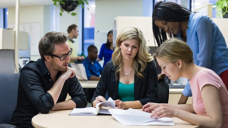 corporate-jargon-employees-around-table