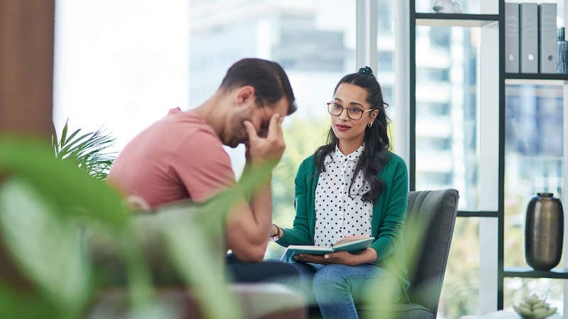 how-to-terminate-an-employee-woman-terminating-an-employee-hes-sad