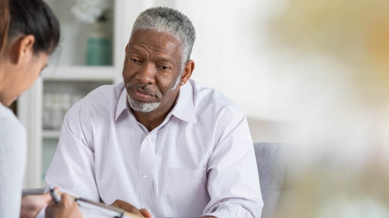 invisible-illness-man-talking-to-doctor