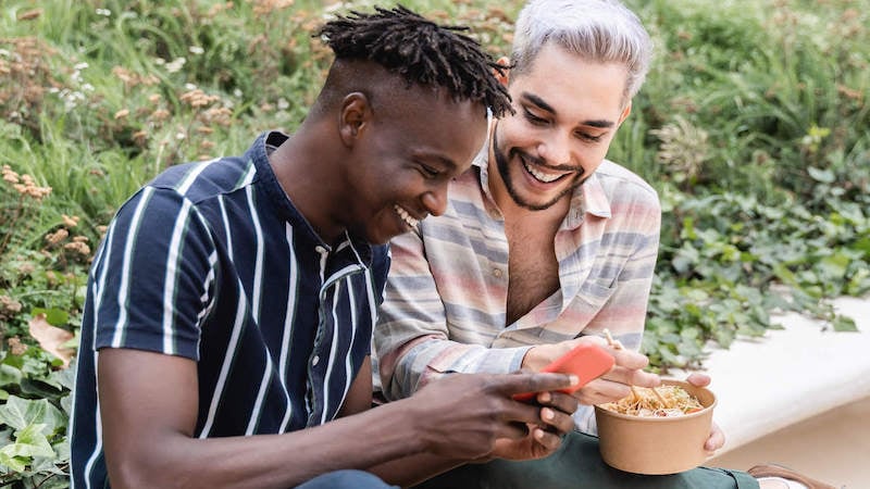 LGBTQ-acceptance-gay-couple-talking-at-park