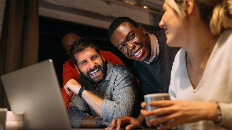 organizational-performance-people-laughing-at-work