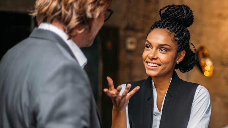 performance-management-woman-talking-to-colleague