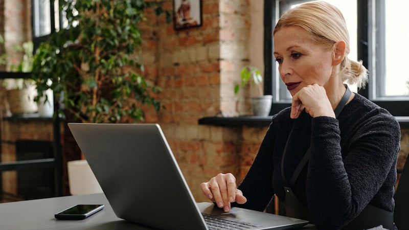 talent-marketplace-woman-searching-on-laptop