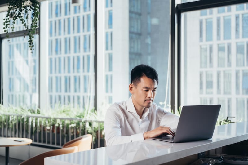 businessman-researching-at-work-the-availability-heuristic