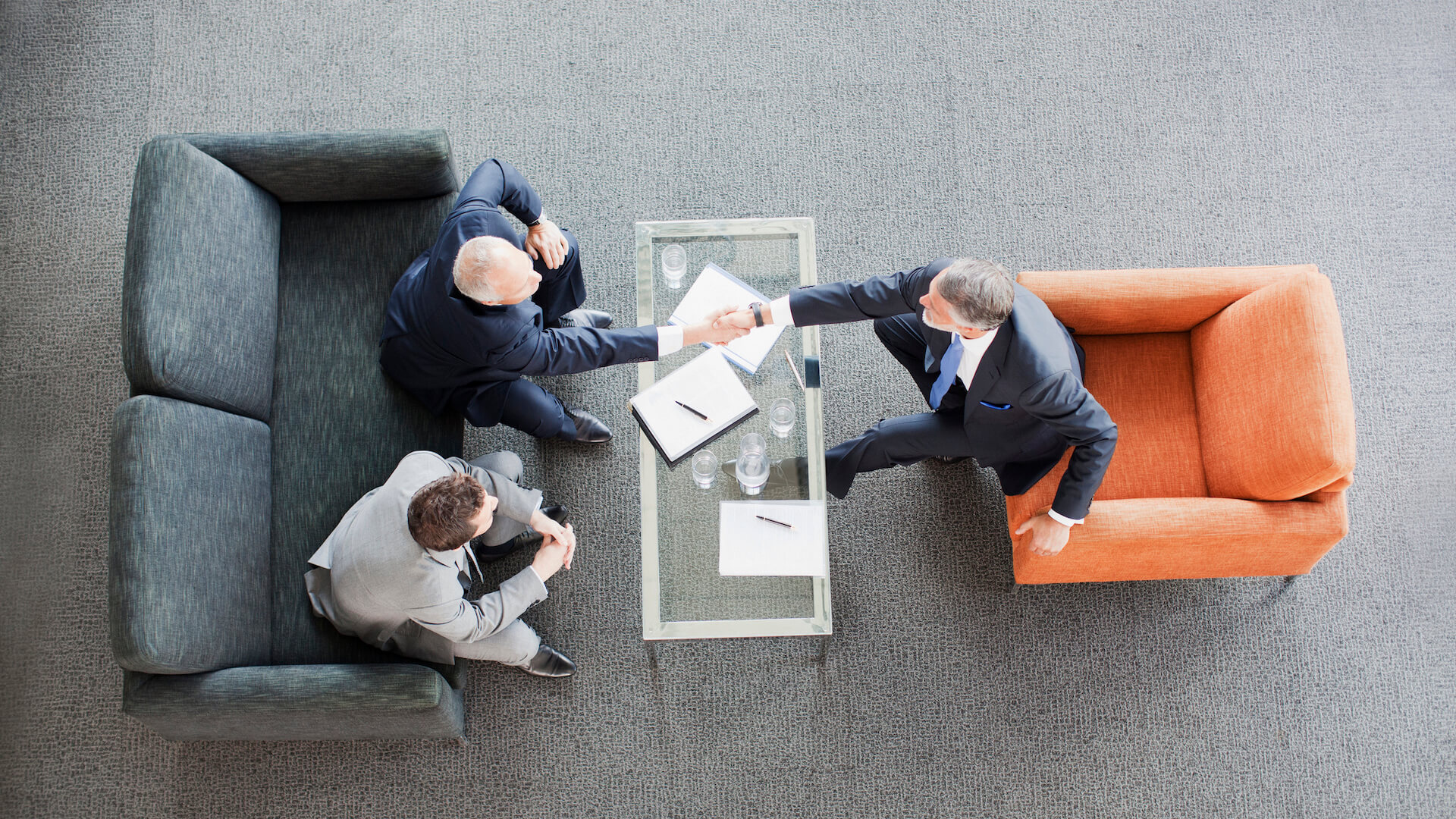 two-people-shaking-hands-conflict-management