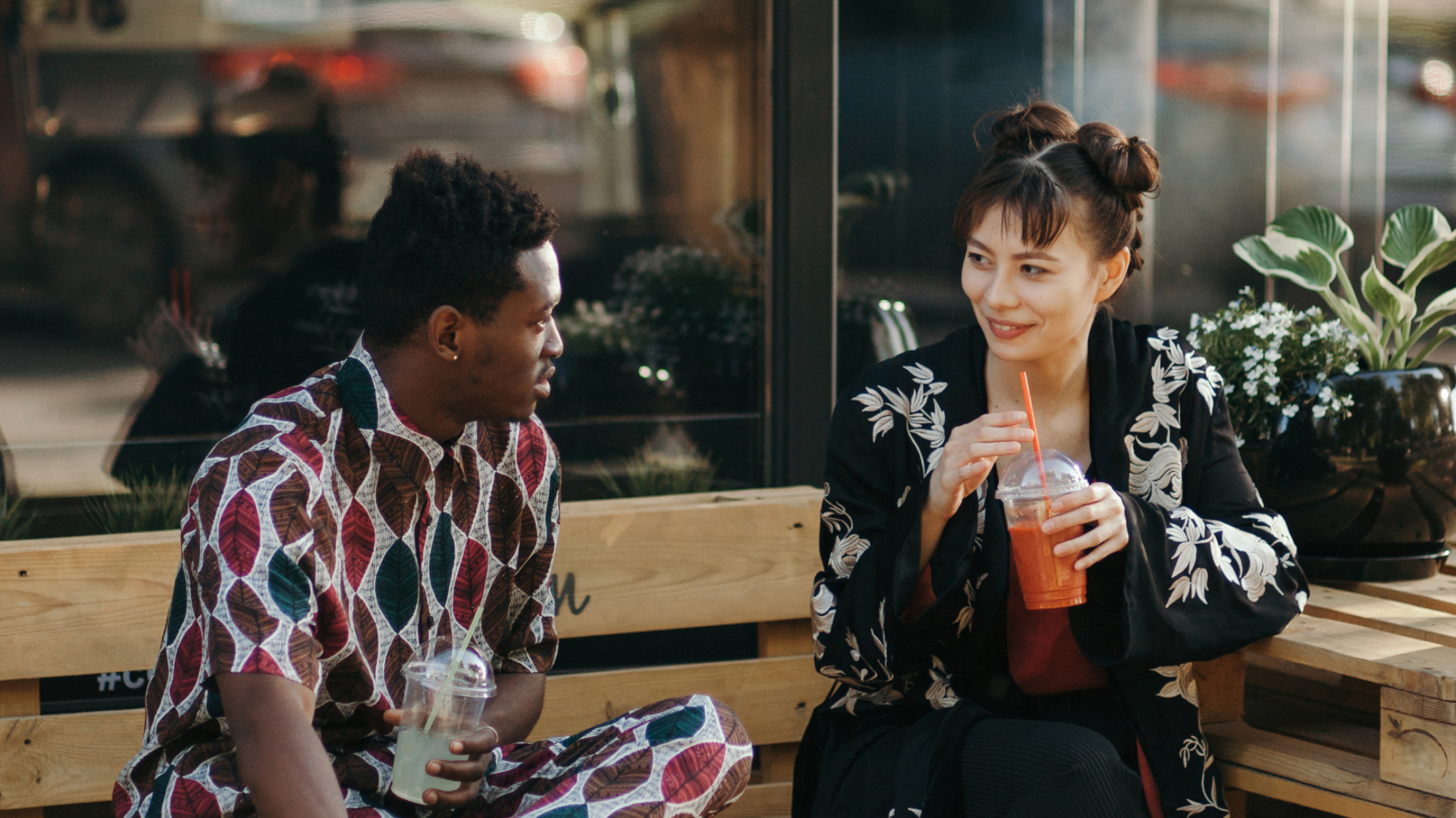 coworkers-chat-on-bench-outside--the-connection-crisis-why-community-matters