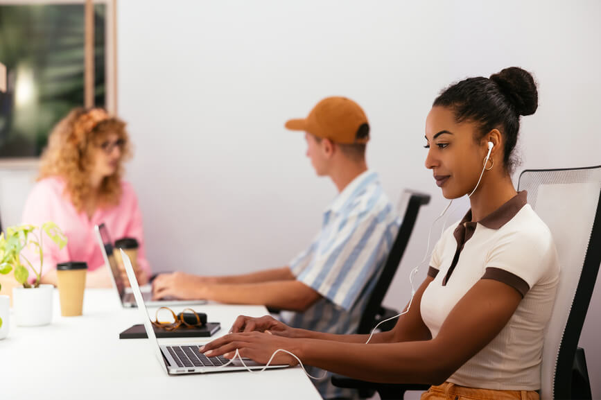 focused-woman-working-at-her-desk-employee-appreciation-ideas