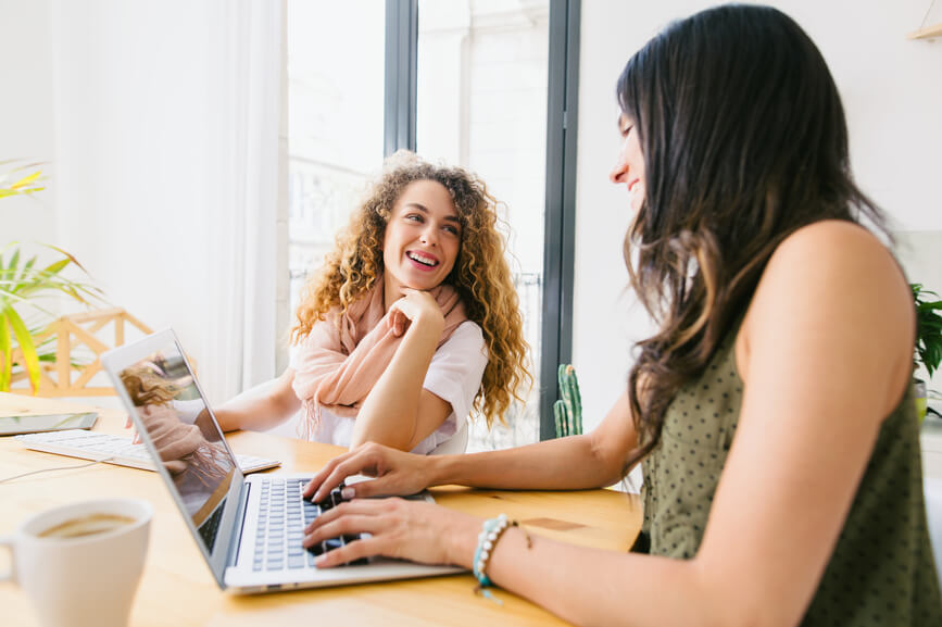 smiling-colleagues-in-discussion-employee-appreciation-ideas