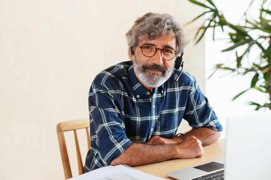 portrait-of-senior-man-at-his-desk-employee-attrition