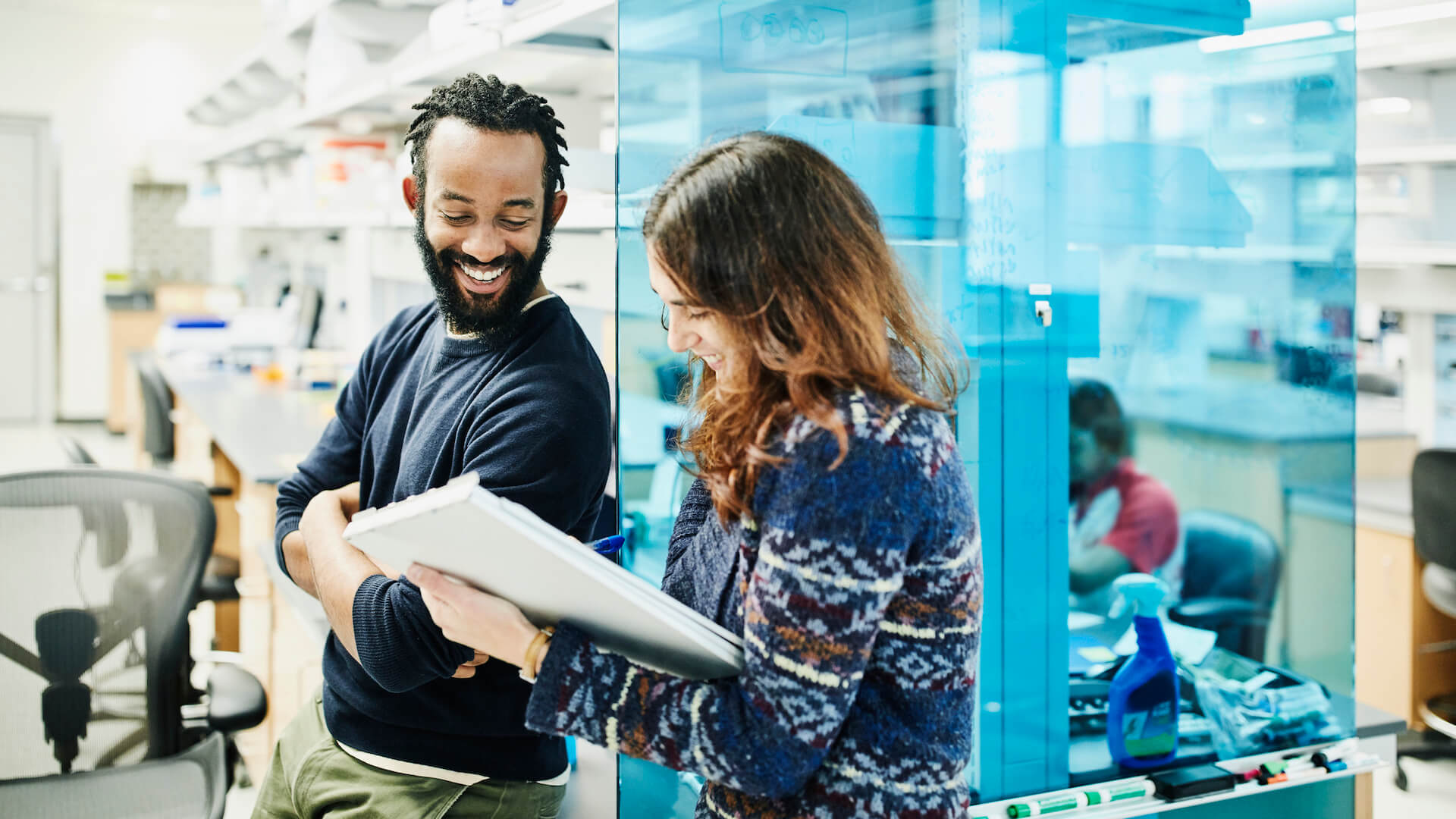 two-people-looking-at-clipboard-employee-loyalty