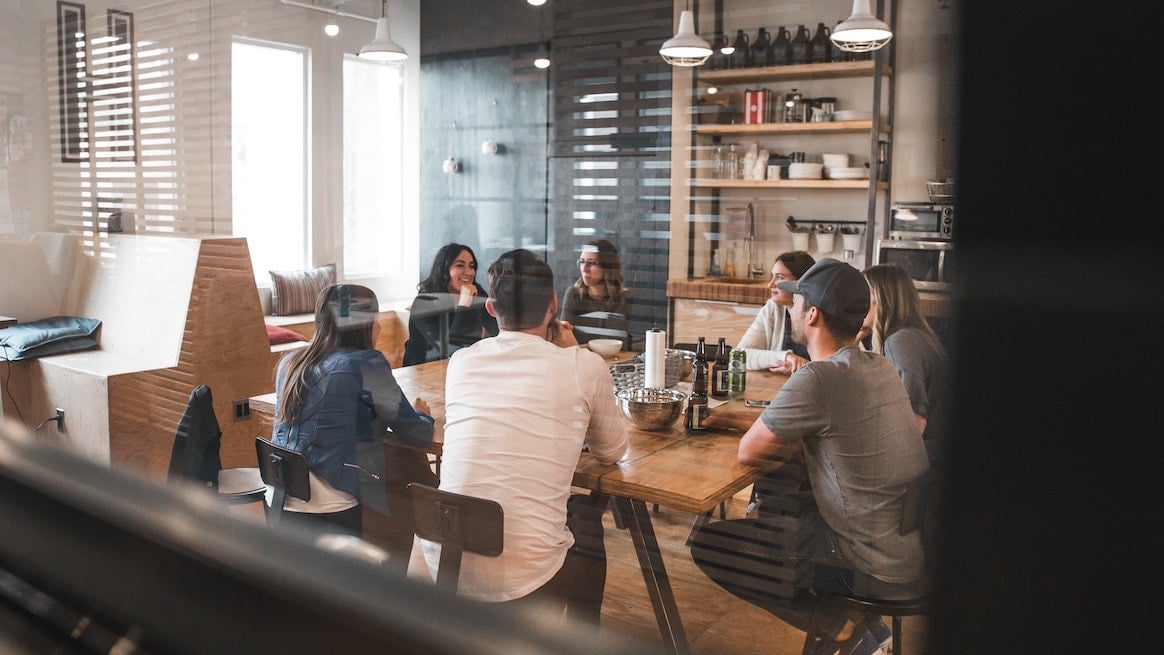 employer-brand-team-around-conference-table