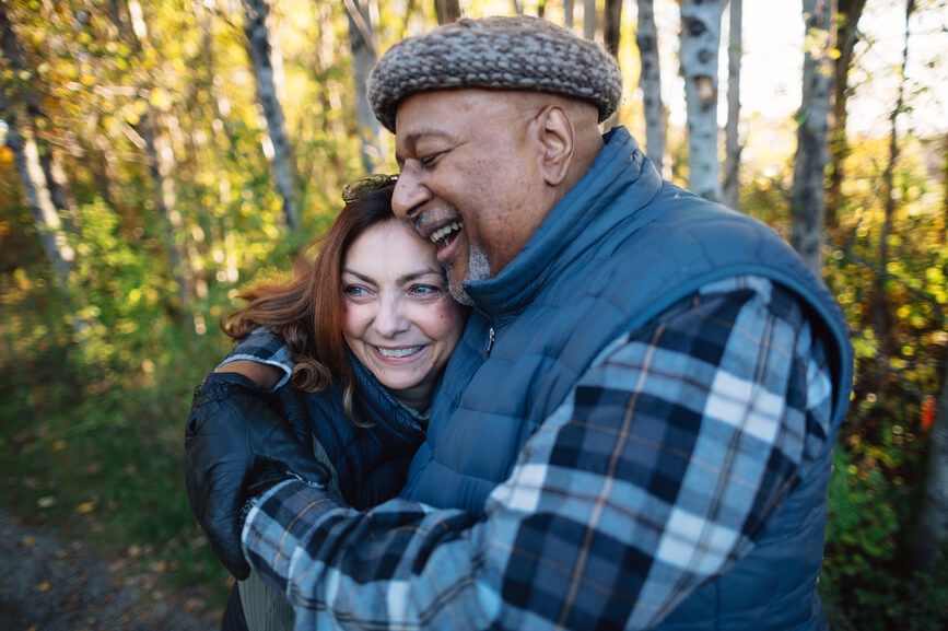older-couple-hugging-outside-empty-nest-syndrome