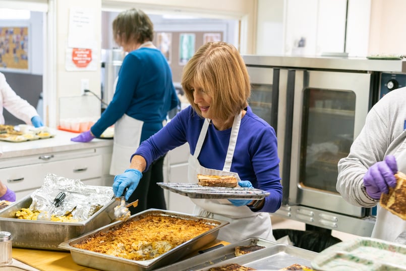 women-serve-food-importance-of-community