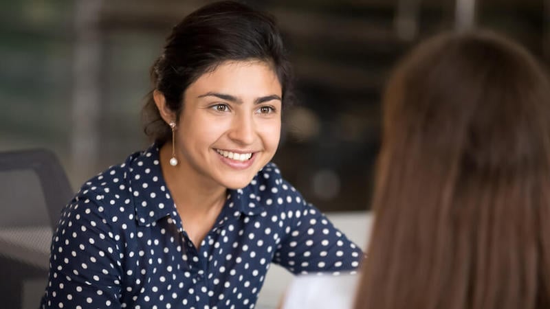 insubordination-in-the-workplace-employee-smiling-at-manager