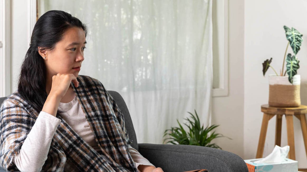 social anxiety_person sitting on couch