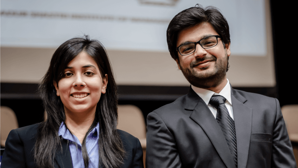stack-ranking-two-colleagues-standing-together