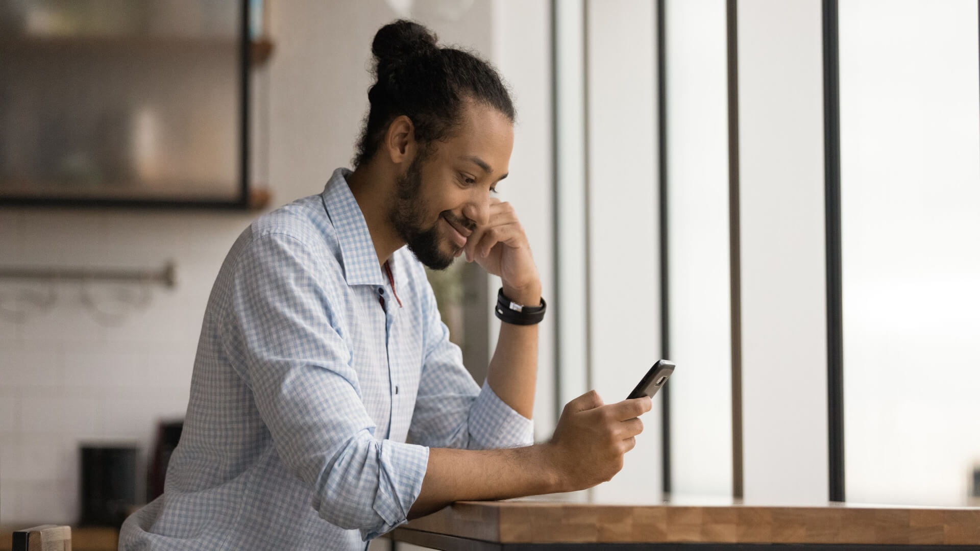 person-looking-at-phone-workforce-development-strategies