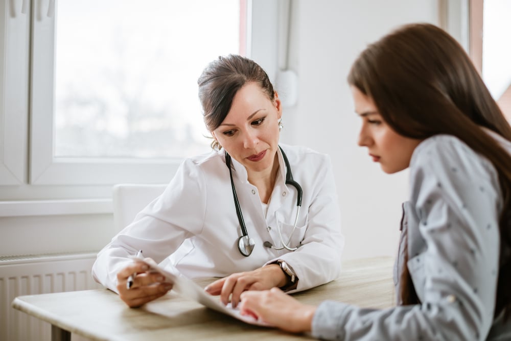 Female-checking-with-a-female-doctor-acute-stress