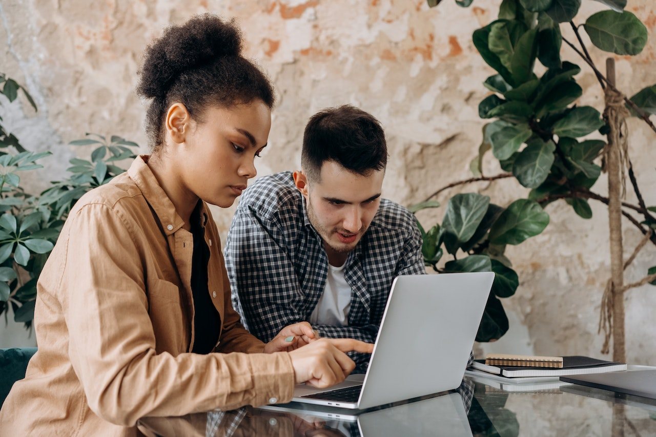 Woman-with-her-collegue-looking-annoyed-at-office-social-comparison-theory