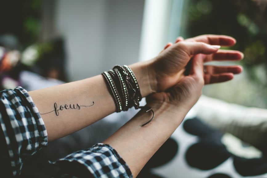 arm-with-the-word-focus-tattooed-on-it-how-to-focus-better