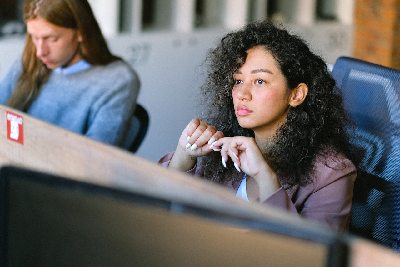 focused-woman-thinking-on-problem-in-office