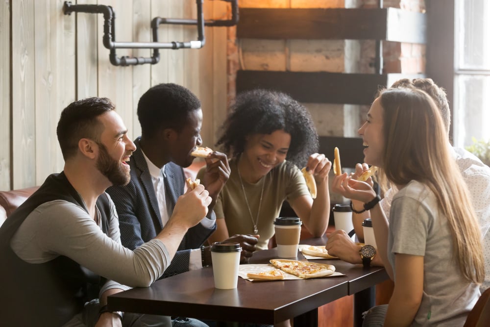 happy-young-people-eating-pizza-what-is-brain-fog