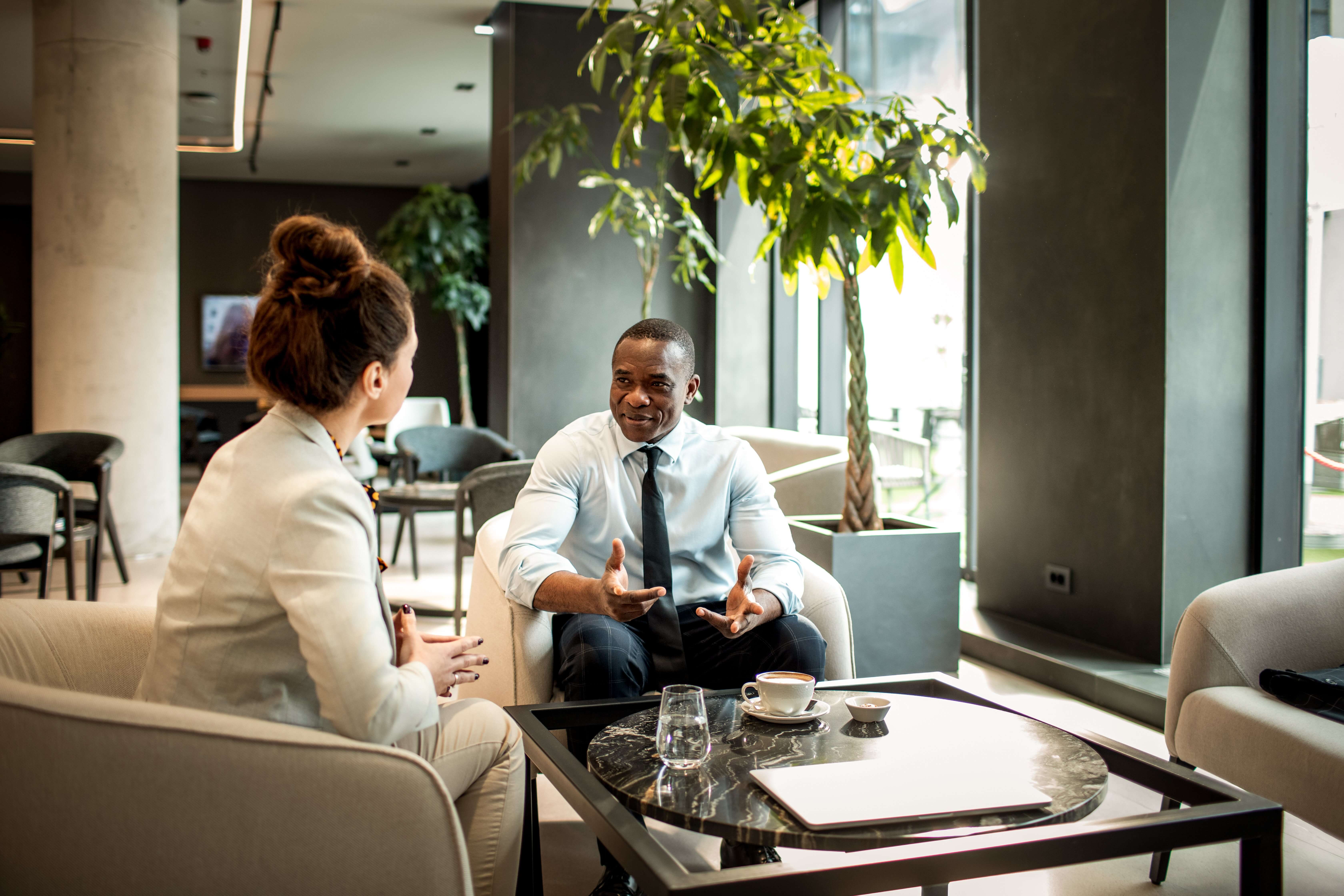 man-leading-meeting-manager-skills (1)