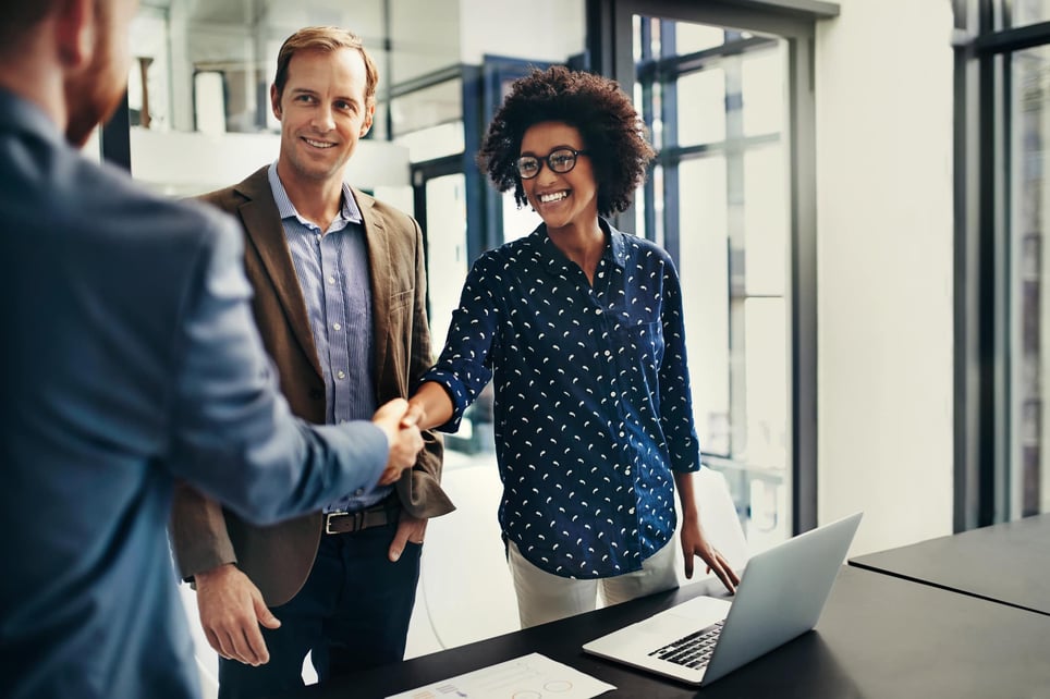 poeple-shaking-hands-being-introduced-how-to-decline-a-job-interview