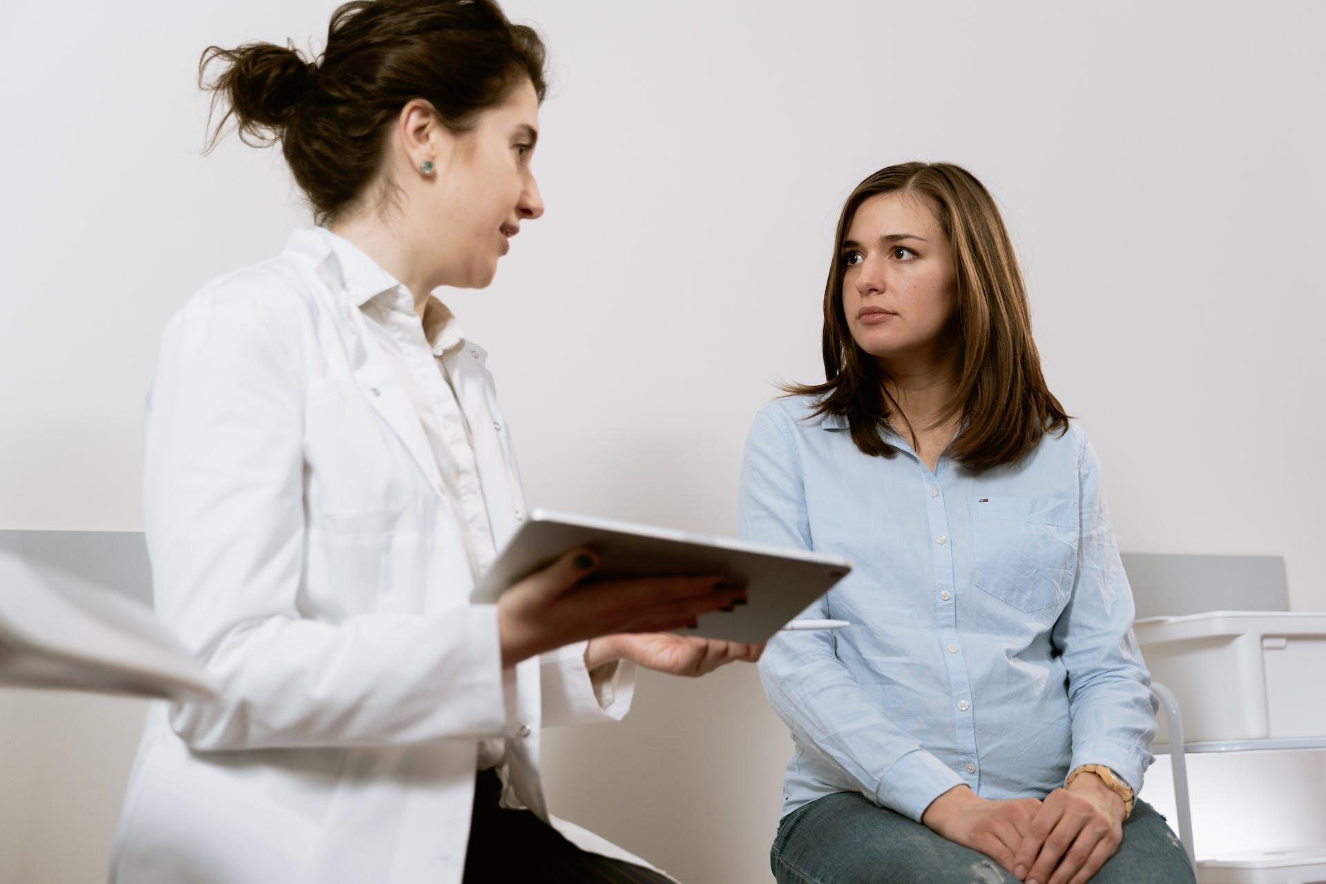 woman-doctor-with-patient-that-is-wearing-a-light-blue-shirt-listening-to-her-what-can-you-spend-fsa-money-on