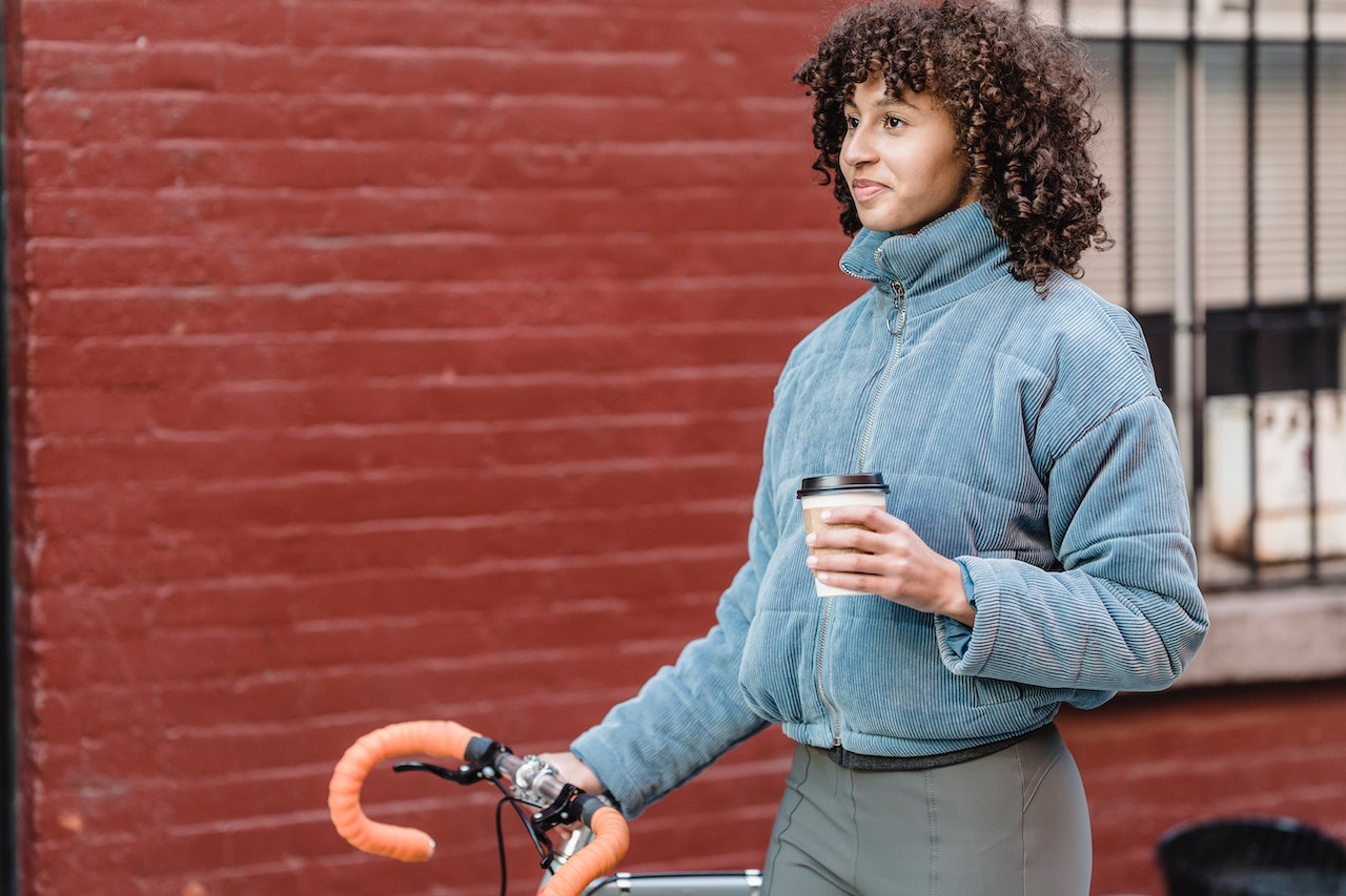 woman-walking-outdoors-by-herself-listening-to-music-what-to-do-when-you-are-sad