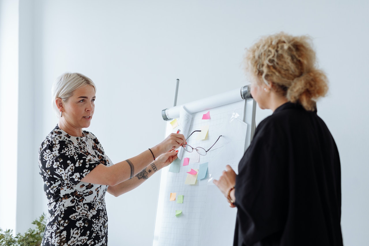 women-discussing-business-together