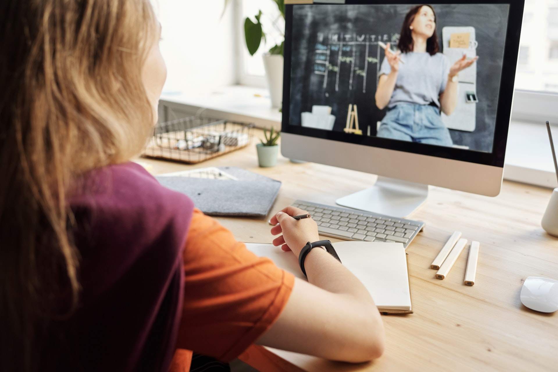 young-woman-writing-from-a-class-career-change-for-teachers