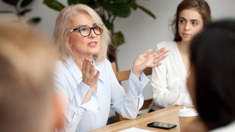 communication-expectations-manager-leading-team-meeting
