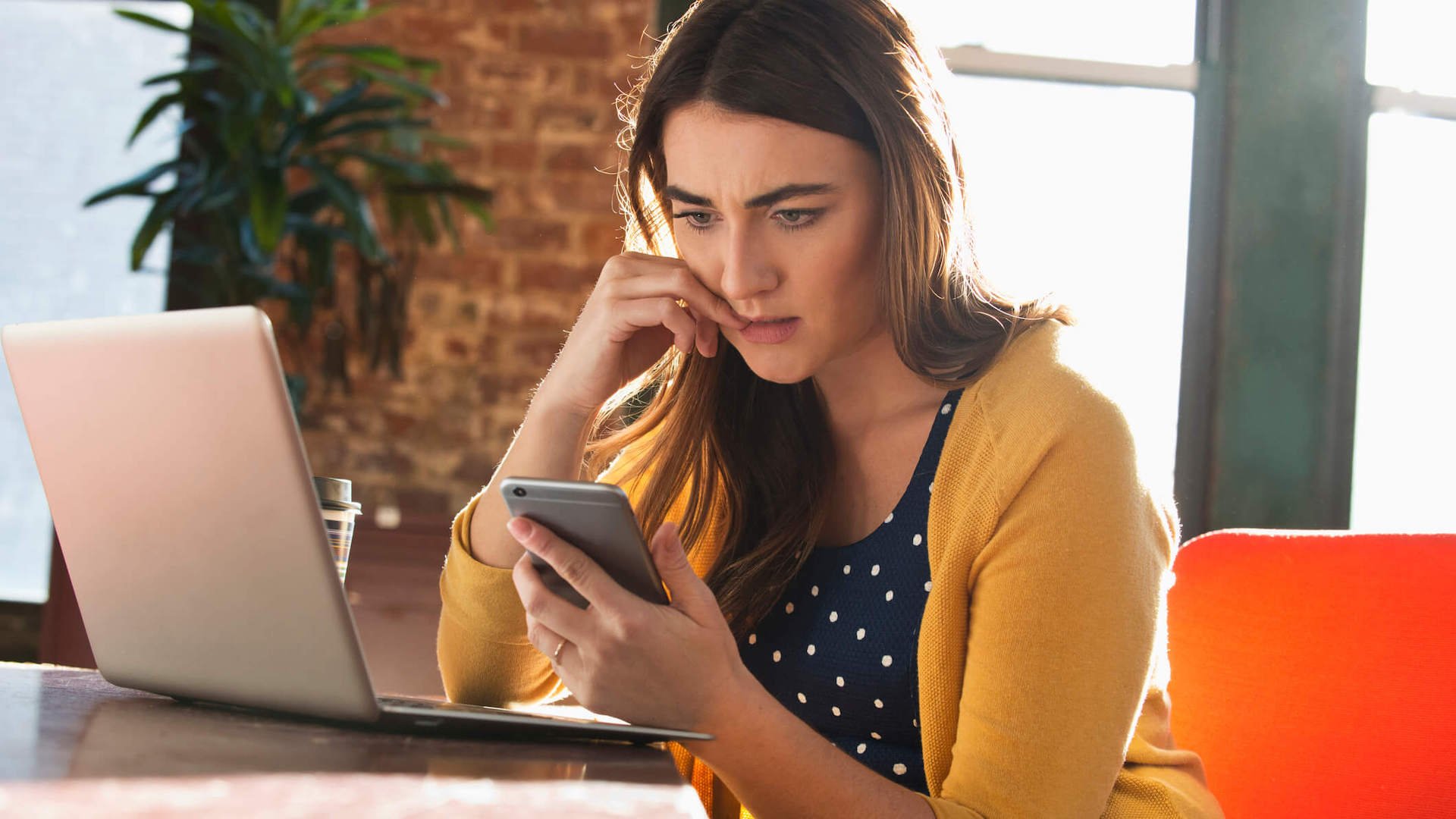 asking-for-a-salary-range-person-staring-nervously-at-phone