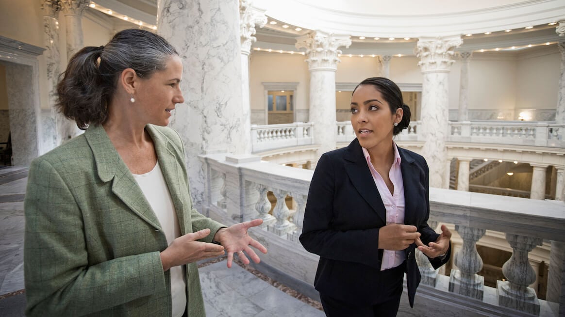 agency leader talks with team member about burnout in government