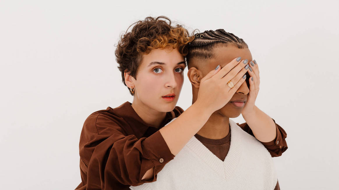 invisible-disabilities-person-covers-someones-eyes-hiding