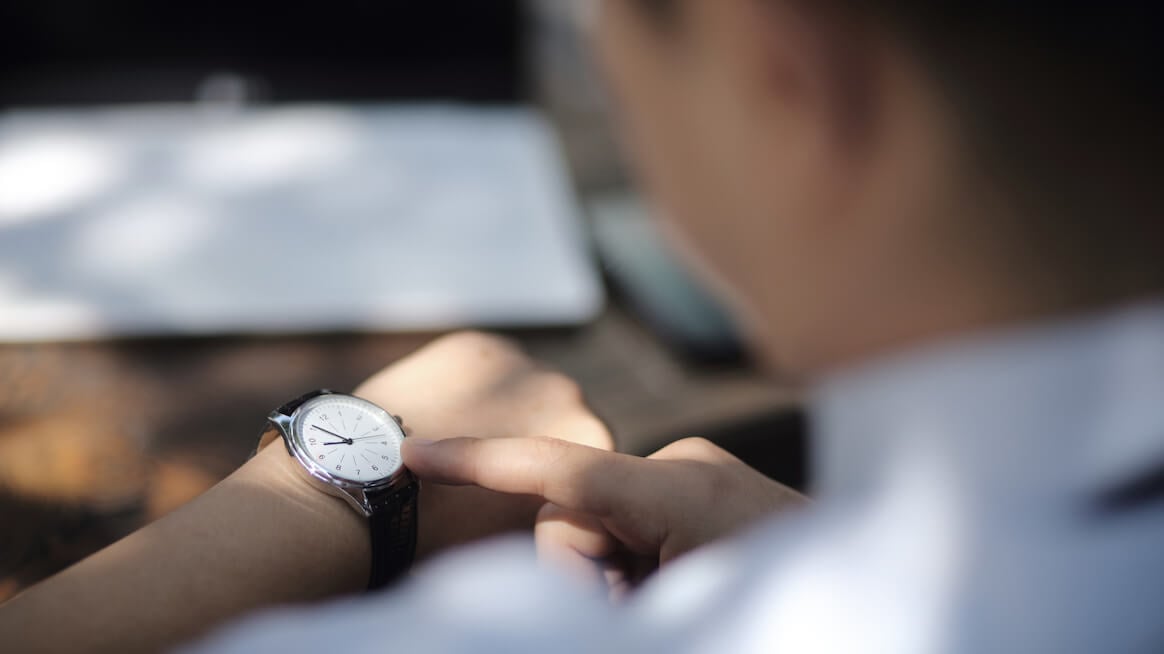 restlessness-closeup-person-checking-watch
