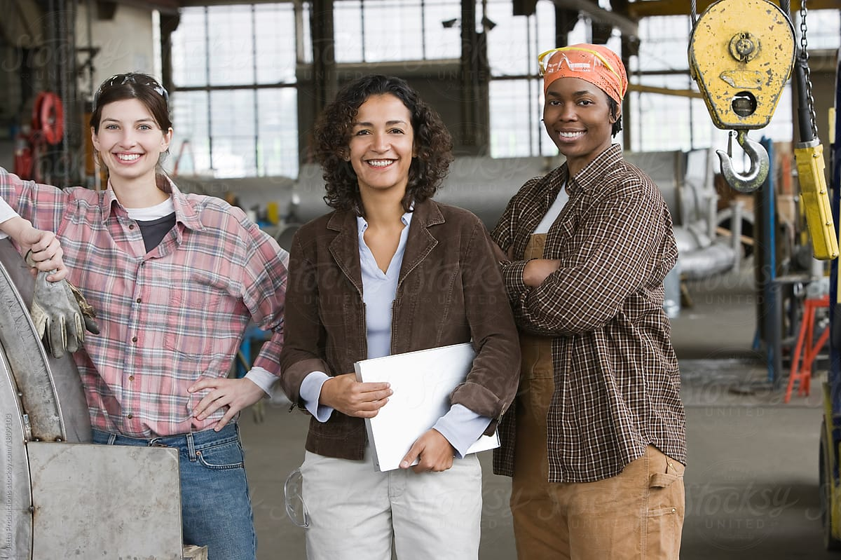 three-factory-workers-smiling-next-to-hook-capital-resources