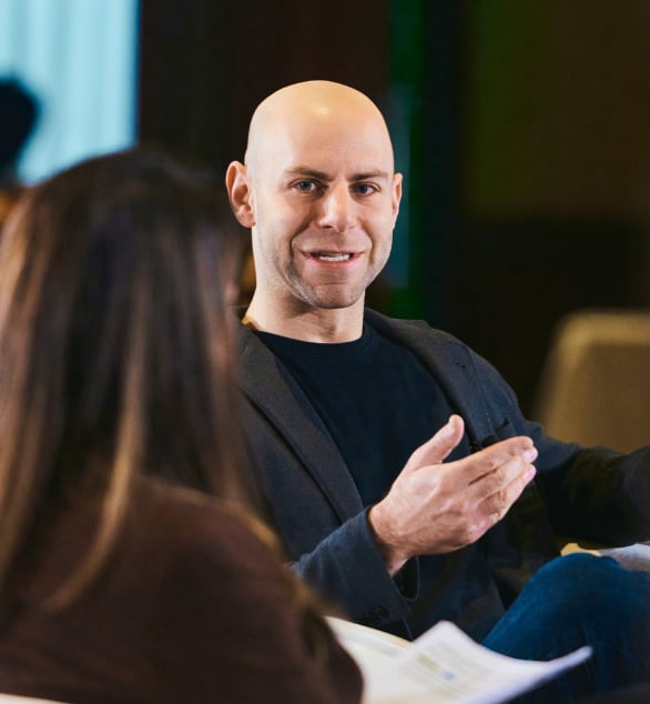 adam grant speaking on stage